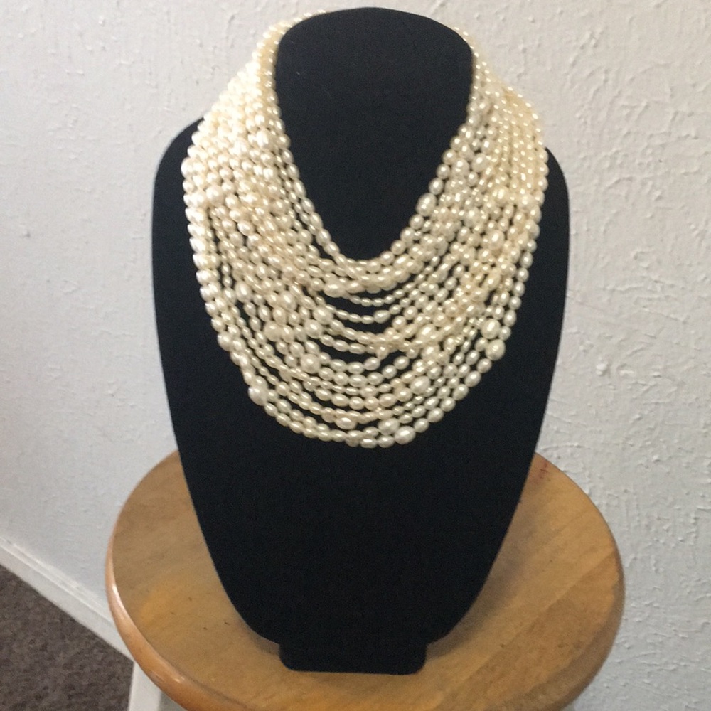 Eighteen Strand Freshwater Baroque Pearl Necklace.